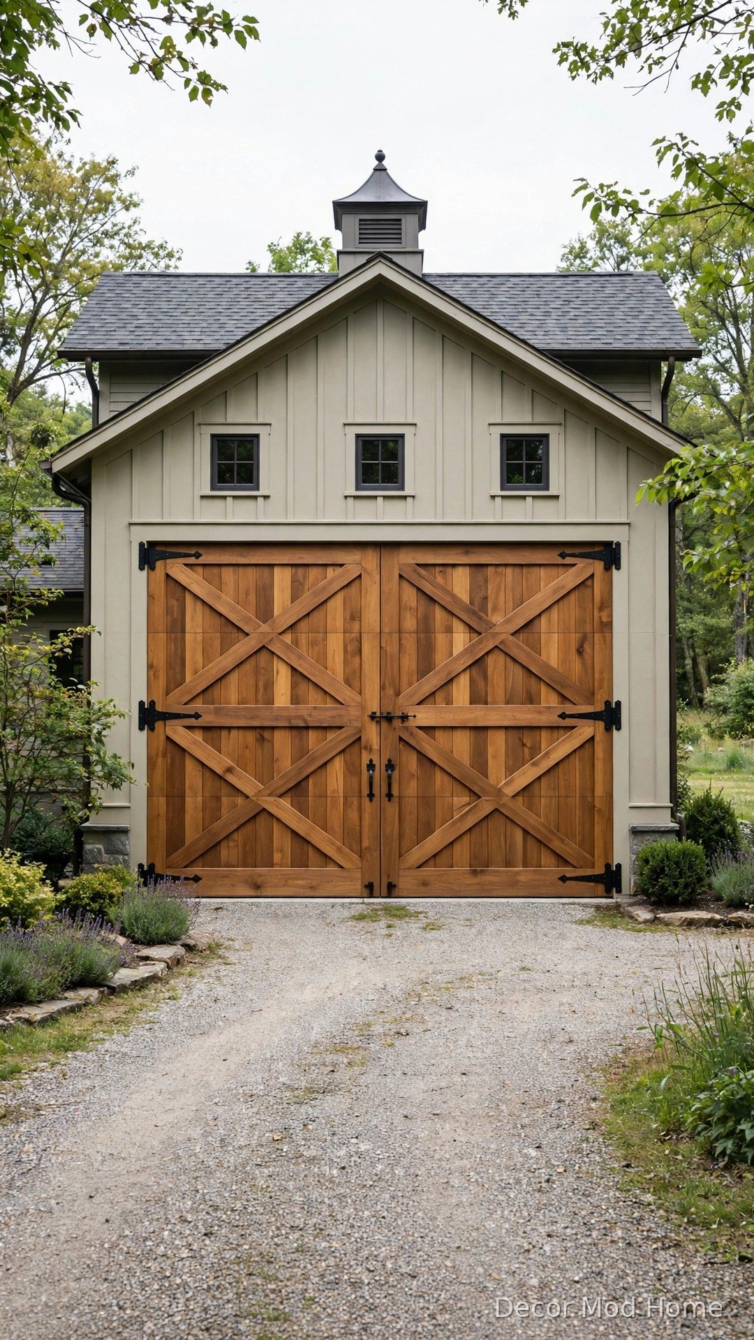 Double X-brace timber barn garage doors in honey walnut on a carriage house